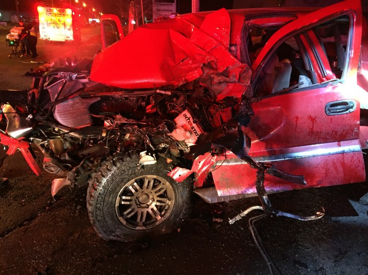 A red Chevy pickup truck traveling north on Madison Avenue in Skowhegan struck a tractor-trailer turning left on to Madison from Jewett Street at 12:30 a.m. Monday, sending four people to the hospital. 