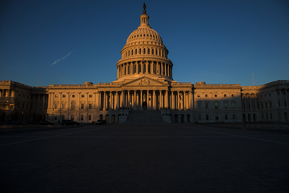 The Capitol is seen at dawn on the 21st day of a partial government shutdown as an impasse continues between President Donald Trump and Democrats on funding his promised wall on the U.S.-Mexico border, in Washington, Friday, Jan. 11, 2019. A new era of divided government began this year with the 116th Congress as the Democrats took control of the House, with Republicans still holding the majority in the Senate. (AP Photo/J. Scott Applewhite)