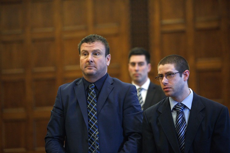 John D. Williams of Madison stands with his attorney Verne E. Paradie Jr., left, during a hearing in Portland on Monday. Williams is charged in the shooting death of Cpl. Eugene Cole in the early hours of April 25, 2018, in Cole’s hometown, Norridgewock. His trial is tentatively scheduled for June.