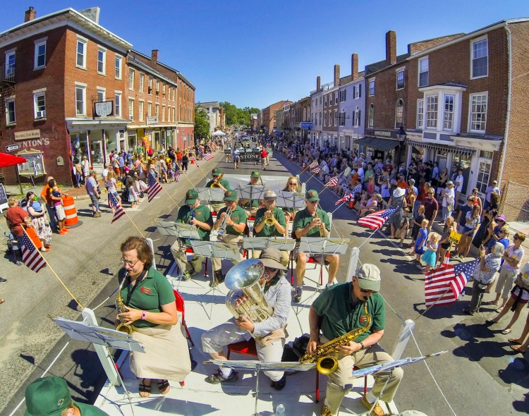 The Hallowell Community Band rides down Water Street during the Old Hallowell Day parade in July 21. 