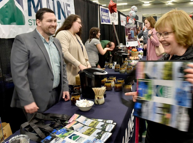 Bruce Harrington of Maine State Credit Union, chair of the Mid-Maine Chamber of Commerce’s Business to Business Showcase committee, staffs his business’s table at this year’s event in Waterville on March 28. Harrington has been awarded the Elias A. Joseph Award by the Mid-Maine Chamber of Commerce. 