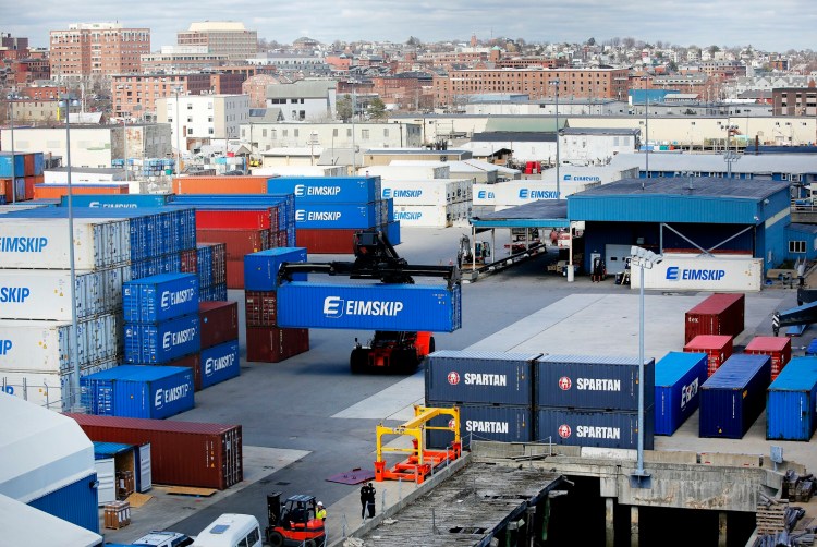 A Reach stacker stacks Eimskip containers Tuesday at the International Marine Terminal in Portland. The largest vessel to ever call on the terminal will arrive April 23.