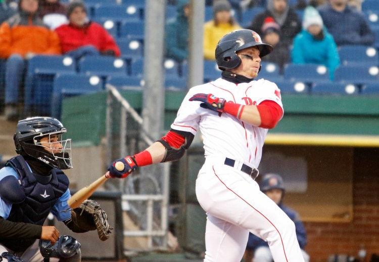 PORTLAND, ME - APRIL 18: Sea Dogs #3 Brett Netzer follows through on a swing in the first inning vs. Trenton Thunder at Hadlock Field. (Staff photo by Jill Brady/Staff Photographer.)