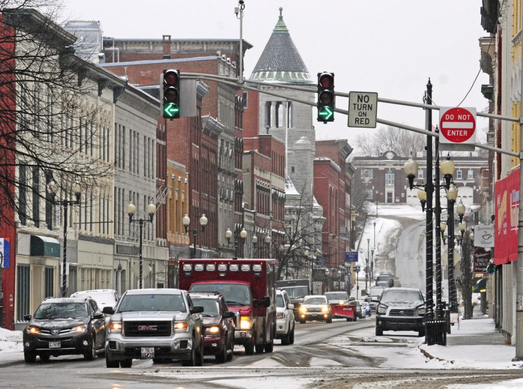 Vehicles travel on the one-way northbound section of Water Street in downtown Augusta on Feb. 7, 2017. The Augusta City Council has voted to turn that part of Water Street back to a two-way traffic pattern.