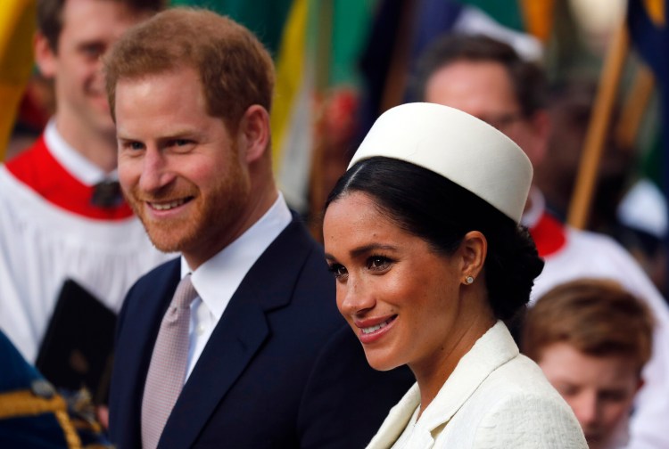 Britain's Prince Harry and Meghan, the Duchess of Sussex, leave Westminster Abbey in April.  