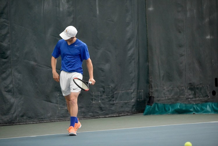 Mt Blue High School's Chris Marshall reacts after losing a point against Brunswick's Lincoln Sullivan at the 2017 Round of 48 state singles tournament in Portland.