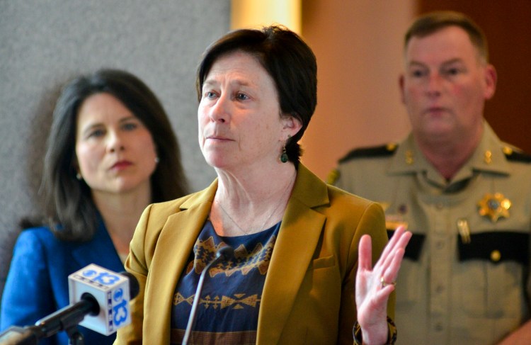 Superior Court Justice Michela Murphy talks during a news conference Thursday about criminal justice changes being made in Kennebec County. District Attorney Maeghan Maloney, left, and Kennebec County Sheriff Ken Mason, right, also spoke at the Capital Judicial Center in Augusta.