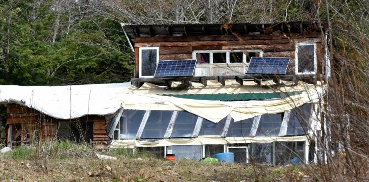 Arson is suspected in a fire that reportedly burned a car and a camper Saturday near this home on Mayhew Road in Starks.