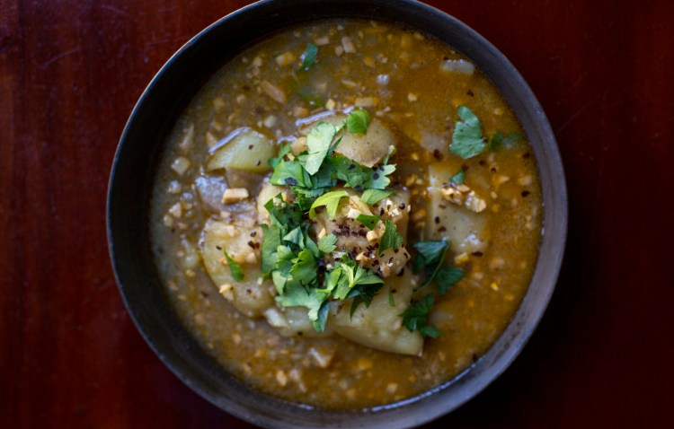 Homemade vegetable broth is used to make a Spanish potato, garlic and almond soup.