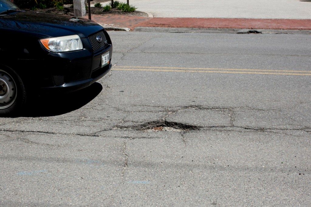 PORTLAND, ME - MAY 9: Potholes dotting India Street on Thursday, May 9, 2019. (Staff photo by Brianna Soukup/Staff Photographer)