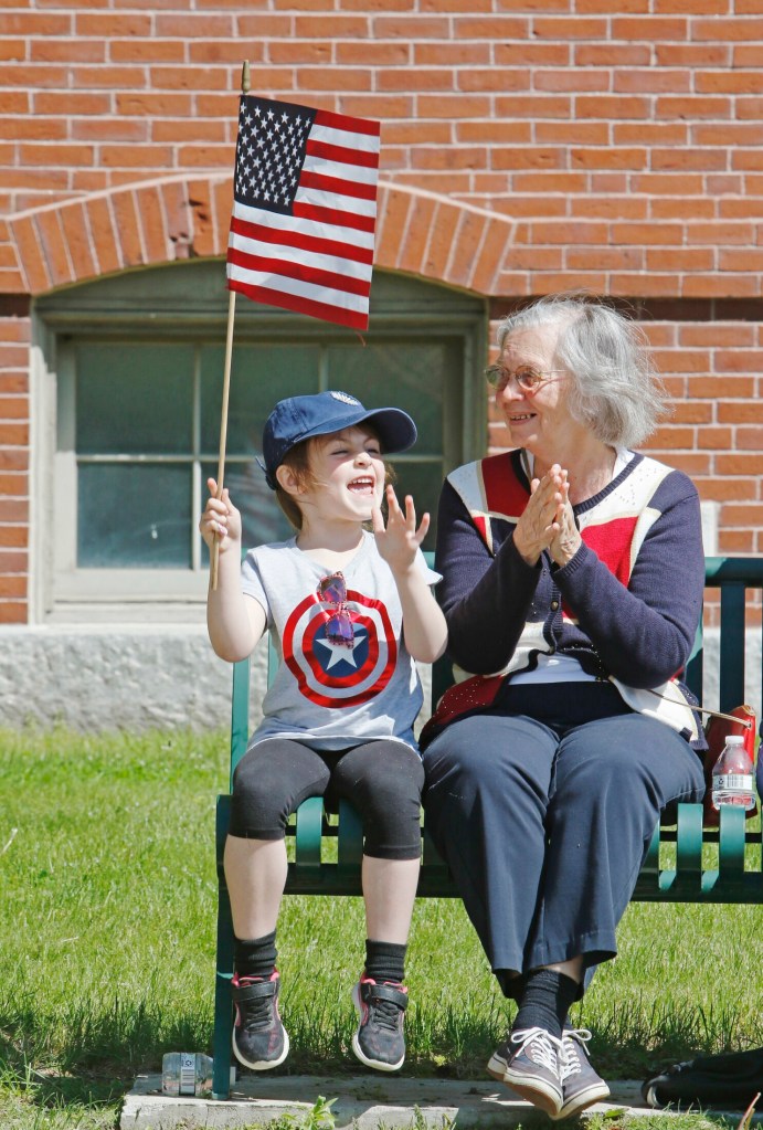 WESTBROOK, ME - MAY 27: Lucy Seavey, 6, and her nanny, Rosemarie Brown, enjoy the Memorial Day parade along Main Street Monday morning. (Staff photo by Jill Brady/Staff Photographer.)