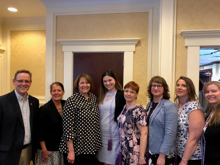 From left are Jonathan Henry, Vice President for Enrollment Management and Marketing; Brenda McAleer, Dean of the College of Professional Studies and Associate Provost; Lynne King, Professor of Nursing and Program Coordinator; and UMA nursing students Hilary Harkins, Veronica Harriman, Danielle Doyon, Karen Dunn and Caitlin Miller.