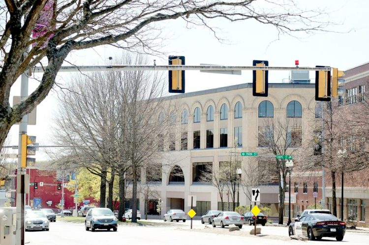 Once an upscale department store, the Peck building in Lewiston now houses a customer service center for L.L. Bean. Auburn Mayor Jason Levesque recently bought the building on Main Street for $5.5 million. 