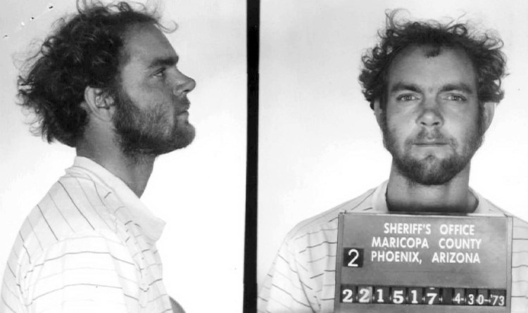 This 1973 booking photo from Arizona shows Terry Peder Rasmussen. Authorities want to learn about a woman he was seen with in the 1970s, saying she may be the mother of one of the young girls whose bodies were found in barrels near a New Hampshire state park in 1985 and 2000. 