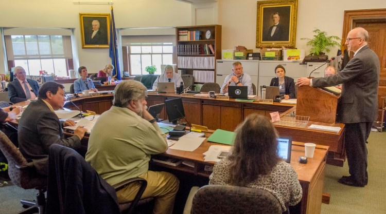 Derek P. Langhauser, chief legal counsel to the governor, testifies Wednesday as the Judiciary Committee considers differing proposals meant to keep guns out of the hands of dangerous individuals.