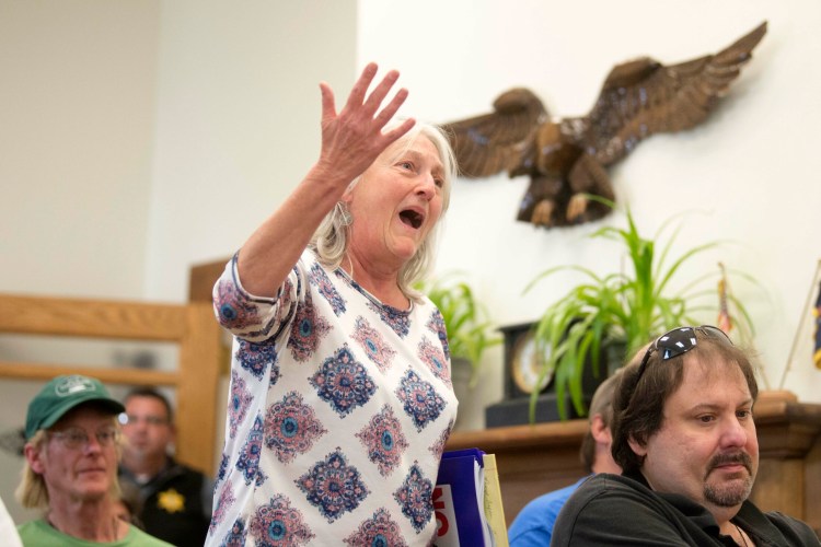 Sheryl Hughey-Harth, of Jackman, pleads on Wednesday with the Somerset County commissioners to hold a new vote on whether to support the New England Clean Energy Connect project because of a possible conflict of interest involving Lloyd Trafton, who also sat on the board of directors for Western Maine & Rivers, during a Somerset County Commissioners meeting at the Somerset County Superior Court in Skowhegan.