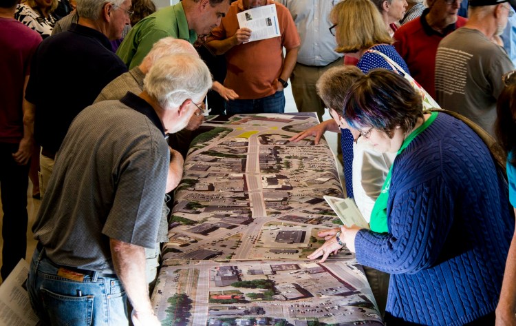 Officials from the State Department of Transportation, the Kennebec Water District, Colby College and the city of Waterville hosted an open house Wednesday to allow businesses, property owners and others to ask questions and air concerns about downtown changes funded by a $7.37 million federal grant. The open house was held at the Chace Forum at the Bill and Joan Alfond Main Street Commons in downtown Waterville.