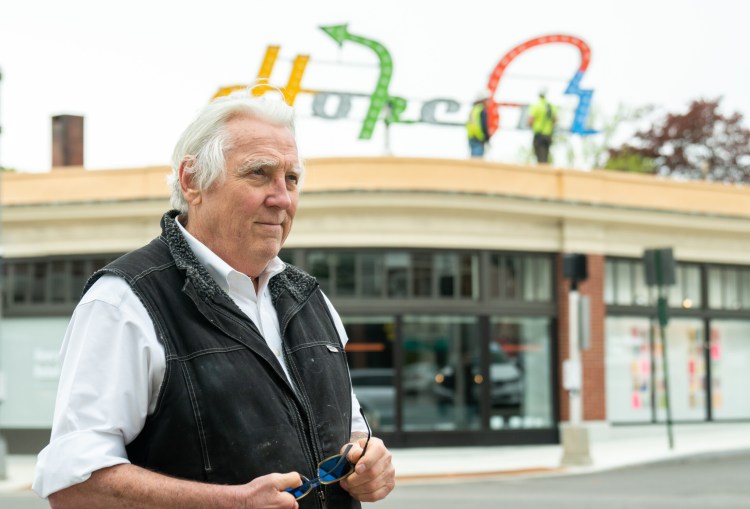 Artist Charlie Hewitt at the installation of his "A Hopeful Prayer for Portland" sculpture at Woodfords Corner.