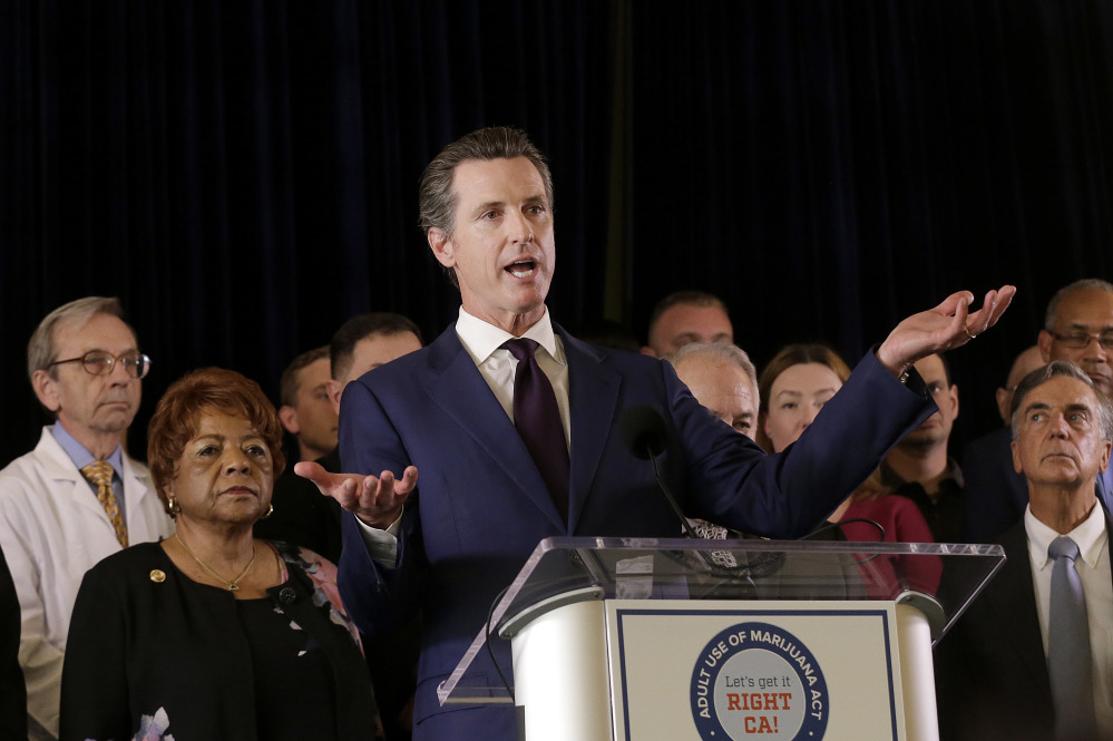 Then-Lt. Gov. Gavin Newsom speaks in support of the Adult Use of Marijuana Act ballot measure in San Francisco.