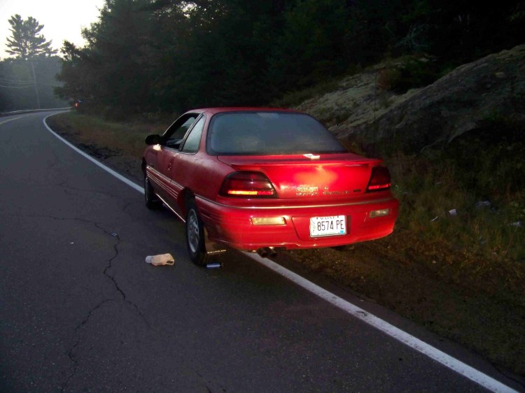 A police photo of the car that was stopped Along Friendship Road in Waldoboro. Gregori Jackson, 18, was a passenger in the car. Jackson’s hat and the police officer’s can of mace are visible on the ground near the rear tire. Jackson was shot and killed by reserve officer Zachary Curtis after a foot chase that ended in a densely wooded area.