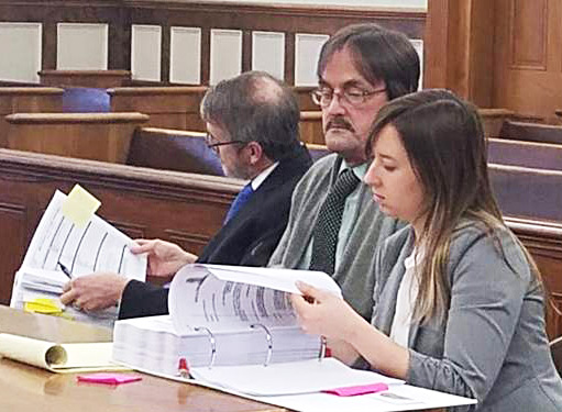 Randall Weddle, center, sitting with his attorneys during his trial, was convicted of   his t, Christopher MacLean and Laura Shaw, in Knox County Superior Court in 2018. 