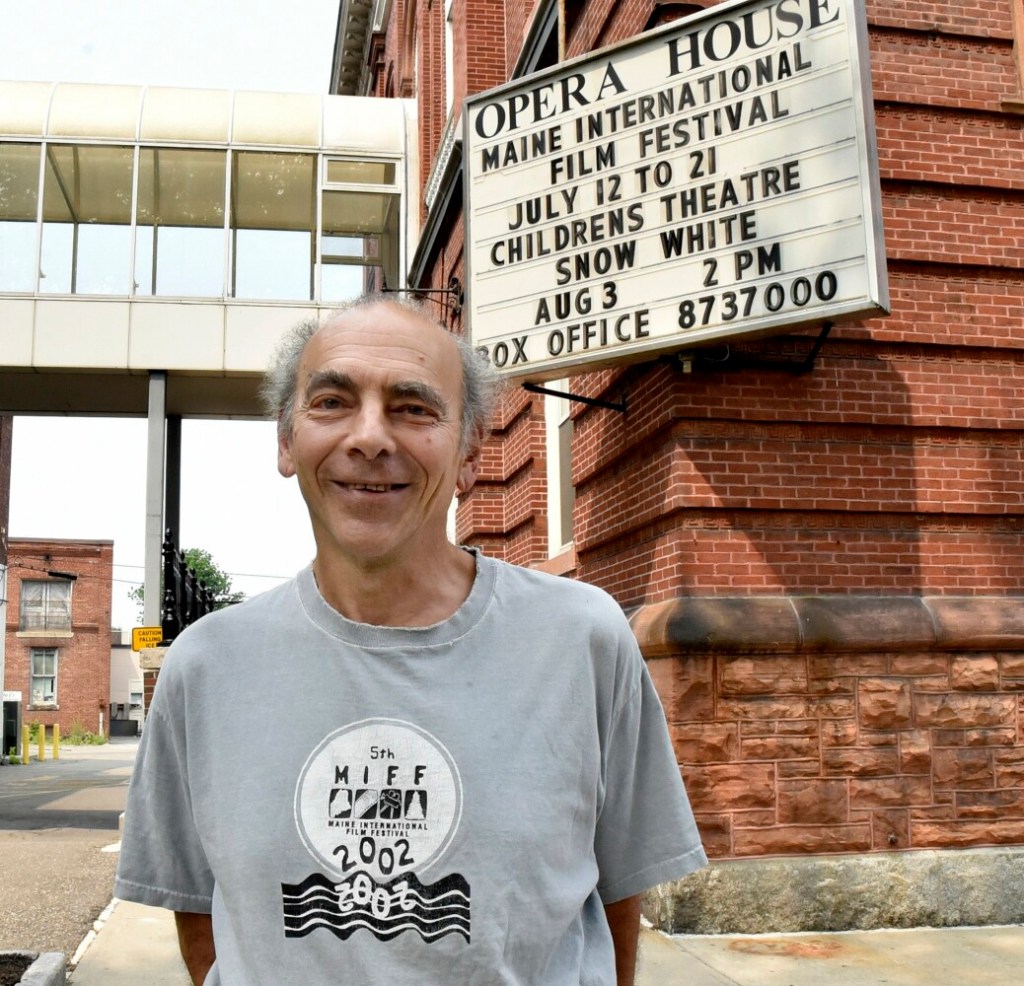 Ken Eisen, programming director for the Maine International Film Festival, stands outside the Waterville Opera House Wednesday where films will be shown during the 22nd annual MIFF.