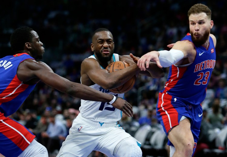 Kemba Walker, center, thanks many people on his way to Boston in a post for the Players' Tribune website, including Charlotte Hornets owner and former NBA great Michael Jordan.