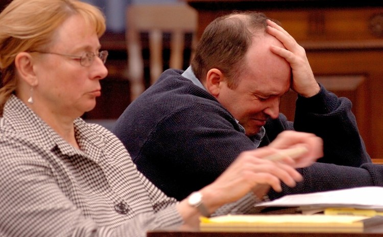 Todd Curry breaks down on Oct. 21, 2015, after brief testimony during a hearing in Somerset County Superior Court in Skowhegan. Curry was found not criminally responsible in the 2006 death of Anthony Tucker. Seated beside Curry is his attorney, Janet Mills, who now is Maine's governor.