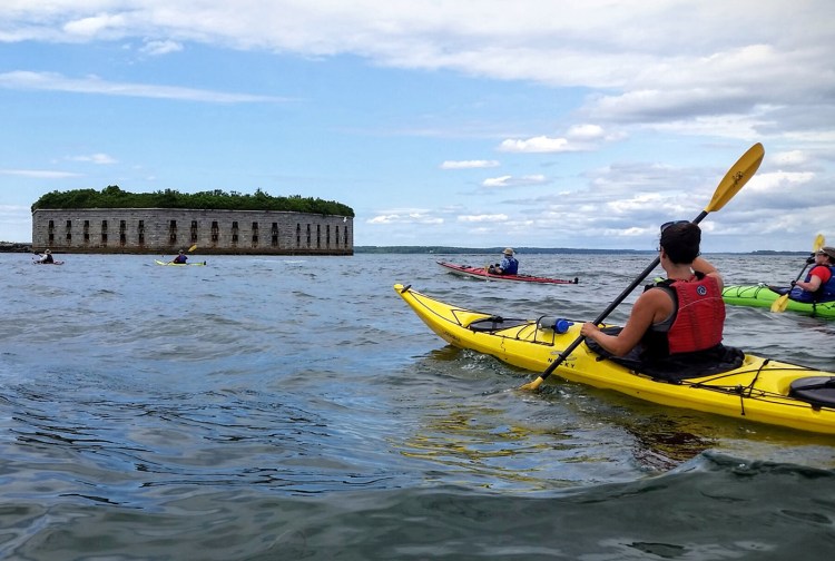 Kayakers make their way to Fort Gorges.