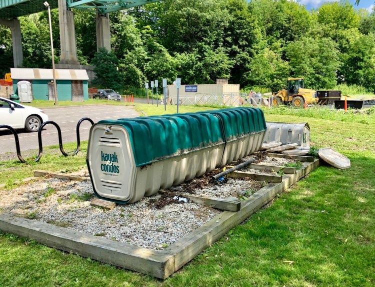 Two "Kayak Condo" storage units at the East Side Boat Launch on Howard Street in Augusta. A dozen of the units were burglarized and damaged July 20; some have since been removed from the location.