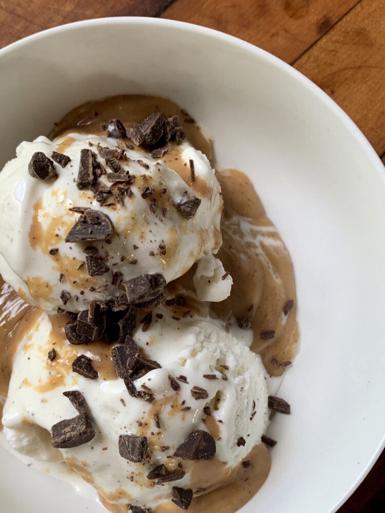 Vanilla ice cream with DIY peanut butter sauce, made right in the jar.