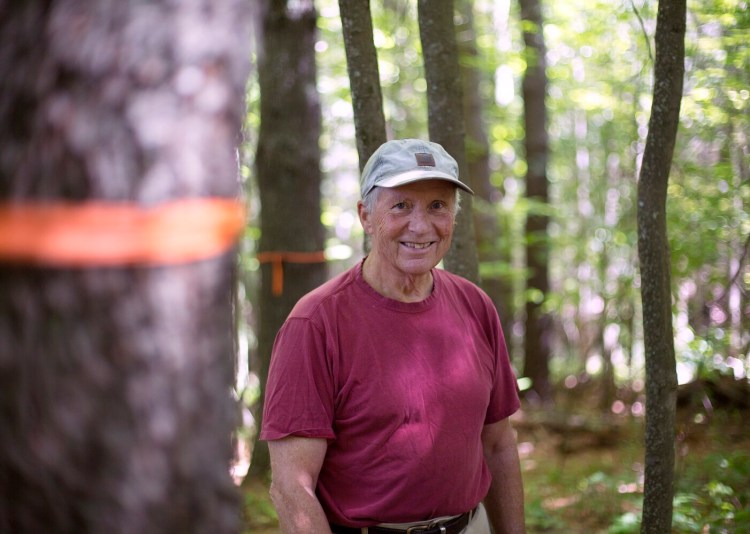 Denny Gallaudet has been harvesting his woodlot in Cumberland for 40 years, mostly for firewood to heat his home, but has changed his management techniques to reduce carbon loss from the carbon-rich soil and carbon-banking trees. 