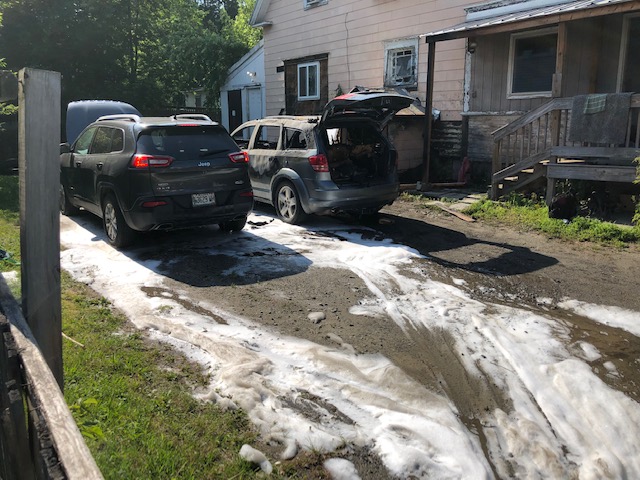 The state fire marshal's office was called to help investigate a fire that apparently started in one of these cars and also reached the house on Friday.