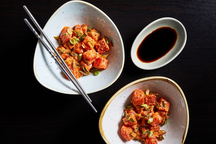 Eating raw ingredients - such as raw fish found in this Spicy Ahi Tuna Poke - is one way to make a meal without turning up the heat. 