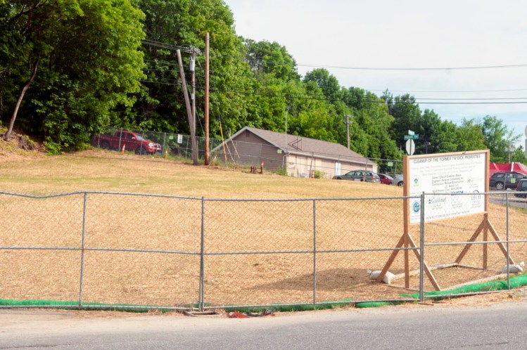 Fences surround the lot that fronts on Bridge Street on July 7, 2017 at the former T.W. Dick site in Gardiner.