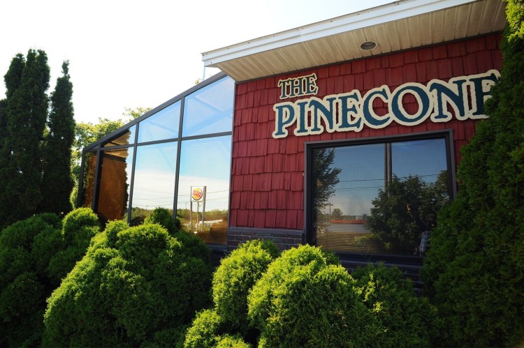 The Waterville Planning Board on Monday will consider rezoning part of 475 Kennedy Memorial Drive to allow an adult-use-marijuana store to open there once state rule regarding adult-use marijuana are issued. The former Pine Cone furniture shop at that address is seen near the Interstate 95 interchange on Thursday.