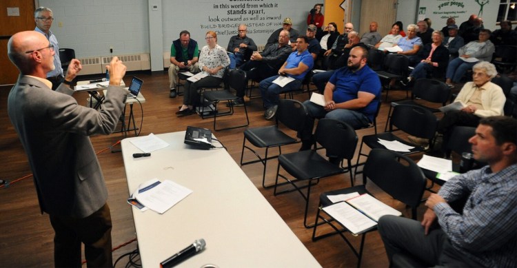 Tom Ericco, a traffic engineer at consultant T.Y. Lin, fields questions from community members Tuesday during a question-and-answer period at the Skowhegan Second Bridge meeting at the community center in Skowhegan.