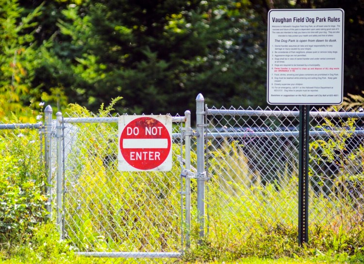 There is a recently installed padlock and Do Not Enter sign on the gate of the closed Hallowell dog park, seen Sept. 11 at Vaughan Field in Hallowell.