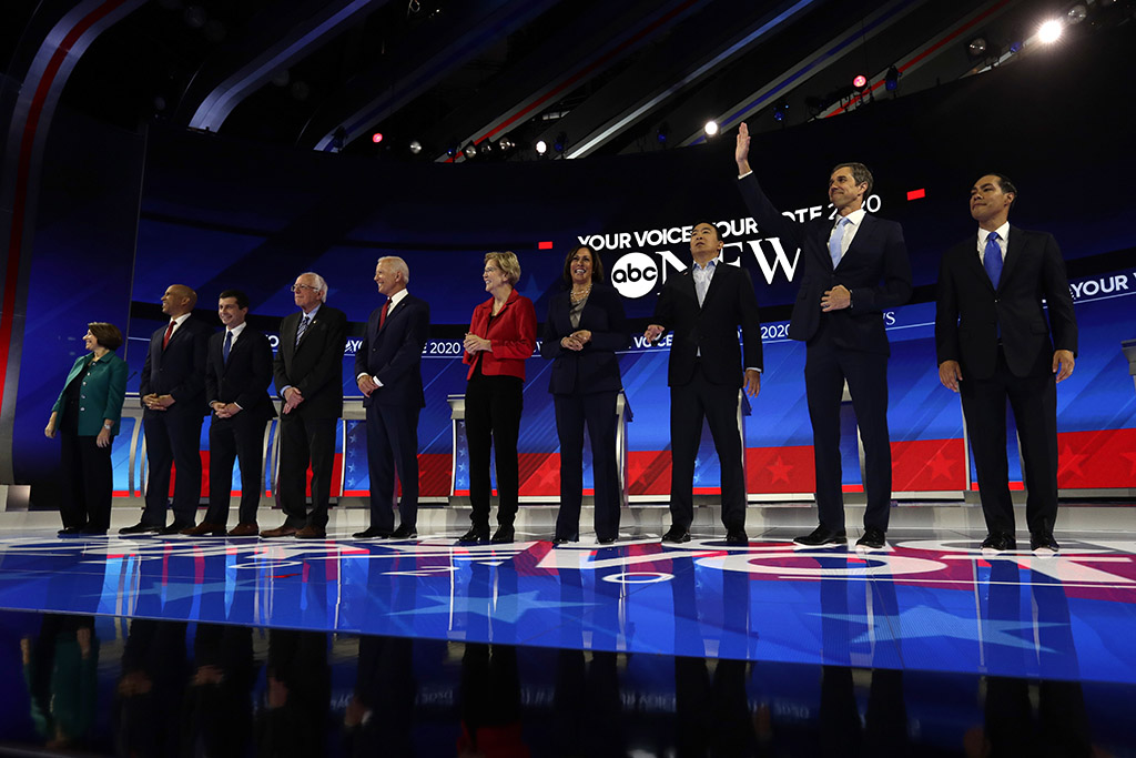 From left, Sen. Amy Klobuchar, Sen. Cory Booker, South Bend Mayor Pete Buttigieg, Sen. Bernie Sanders, former Vice President Joe Biden, Sen. Elizabeth Warren, Sen. Kamala Harris, entrepreneur Andrew Yang, former Texas Rep. Beto O'Rourke and former Housing Secretary Julian Castro are introduced for the Democratic presidential debate Thursday in Houston.