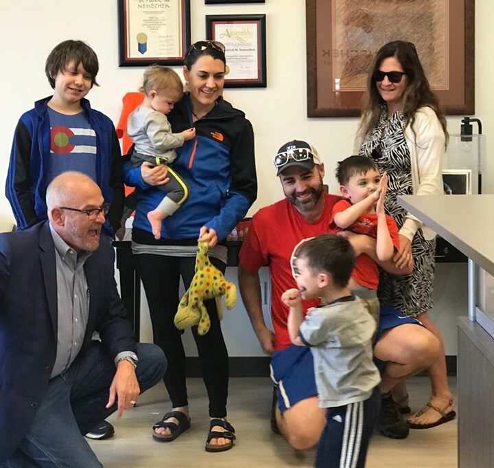 The Cobb family of Hallowell is seen in Buckeye, Arizona, visiting Dr. Patrick Nemechek, kneeling, who is an autonomic nervous system specialist. Lorenzo Cobb, 13, stands at left beside mother, Suzanne Cobb, who holds Lochlin Cobb, 1. Father Justin Cobb kneels in the middle and holds Luther, 3, in front of Linus, 5. Justin’s mother, Lynne Cob, who flew to Arizona to assist the family during the appointment, stands at right. Photo courtesy of Nemecheck Consultative Medicine