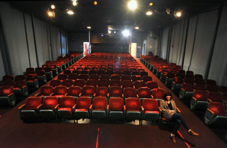 Jaime Jensen, manager of the Pittsfield Community Theatre, says she saw her first movie, "E.T. the Extra-Terrestrial," at the theater, which opened in 1915. The Town Council has decided to close and sell the venue.