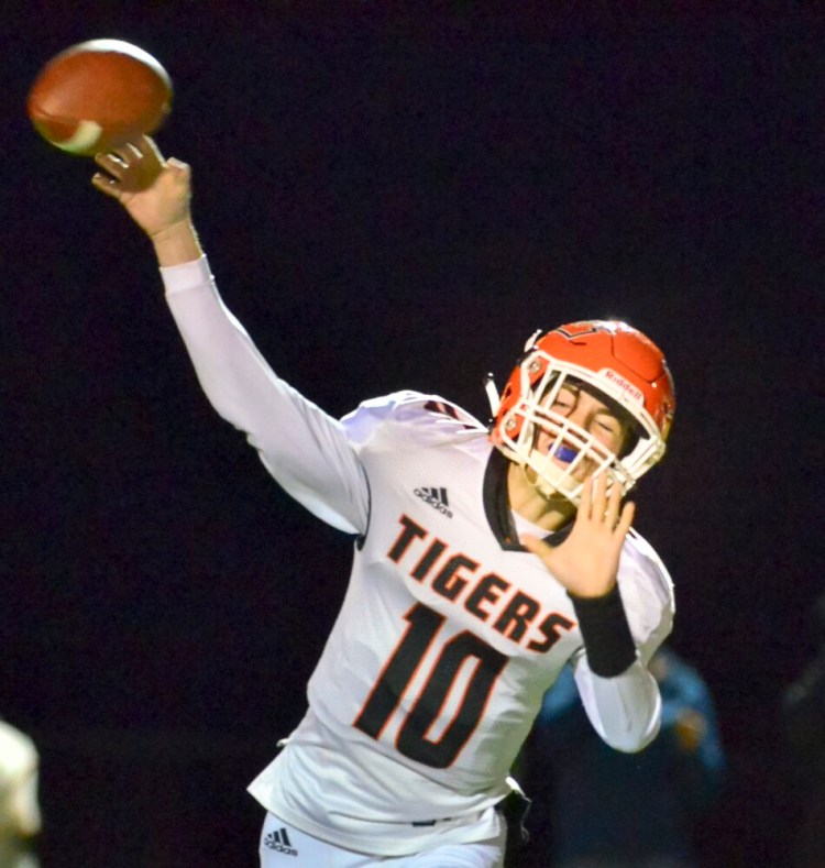 Gardiner quarterback Noah Reed throws a pass against Mt. Blue in a Pine Tree Conference B game last Friday in Farmington. 