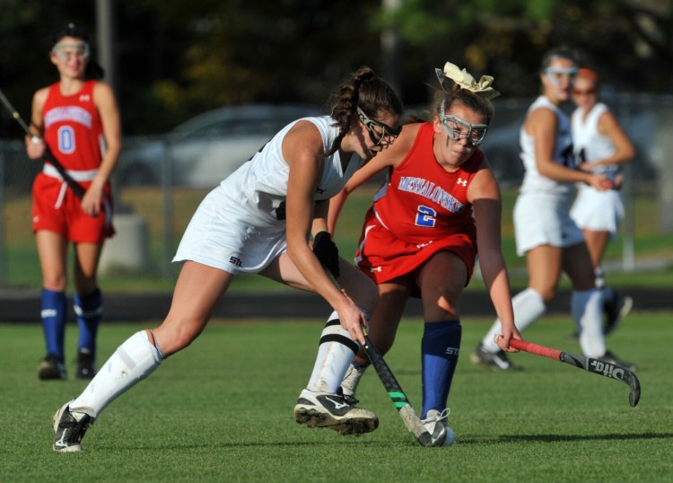 Skowhegan's Bhreagh Kennedy, left, and Messalonskee's Olivia Saucier battle for the ball during a Class A North game earlier this season  in Skowhegan.