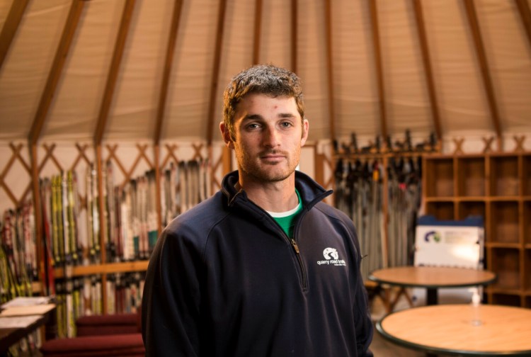 Justin Fereshetian, program director and ski coach for Quarry Road Trails, stands for a portrait in the warming yurt at Quarry Road on Thursday.