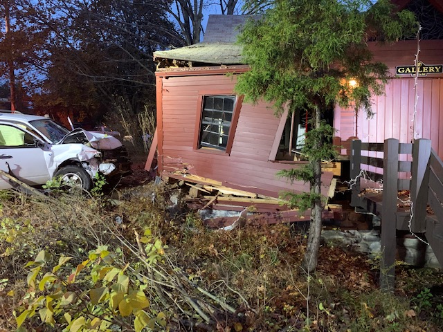 A car slammed into a building Friday morning in Casco.