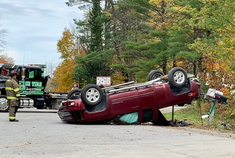 Authorities respond Friday morning to the scene of a fatal car crash on Middle Road in Sidney. 