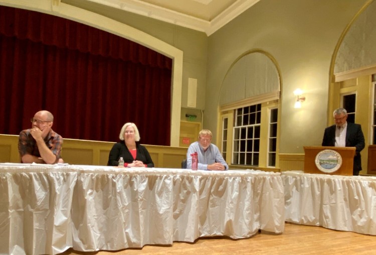 City Council candidate Matthew Radasch, left, Ward 3 Council Candidate Diana Scully, Councilor-at-Large George Lapointe and Mayor Mark Walker listen to a question during Monday's forum at Hallowell City Hall.