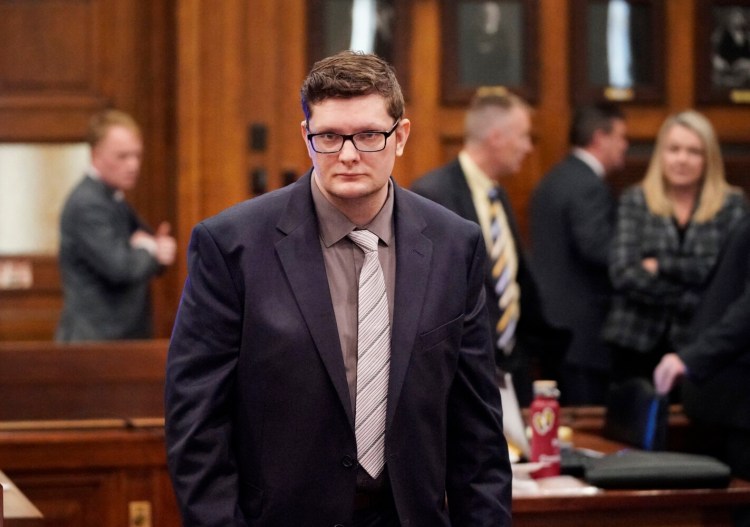 Noah Gaston walks to the defense table during his murder trial at Cumberland County Superior Court in Portland on Nov. 13, 2019.