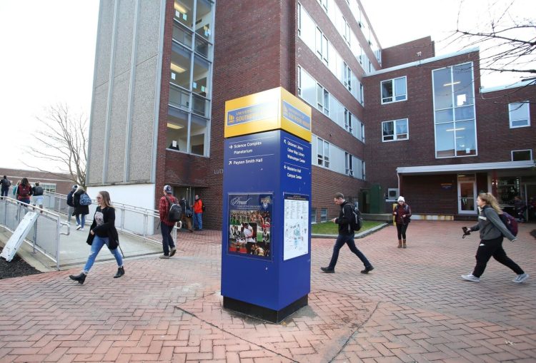 The University of Southern Maine's plan to reopen this fall includes regular testing, more distancing, increased cleaning and sanitation and other safety measures. In this photo taken pre-pandemic, students change classes on the Portland campus. 