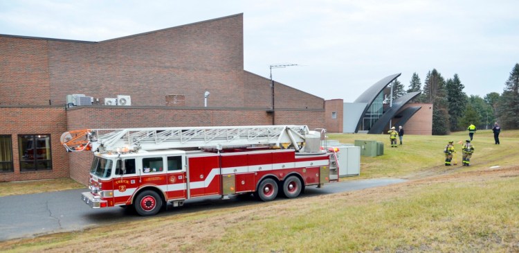 Augusta Fire Department responded to a small fire inside the Katz Library on Friday at the University of Maine at Augusta campus. Dozens of UMA Senior College students watching "Schindler's List" for a classic films class in the Klahr Center, at far right, had to be evacuated and their class was canceled.